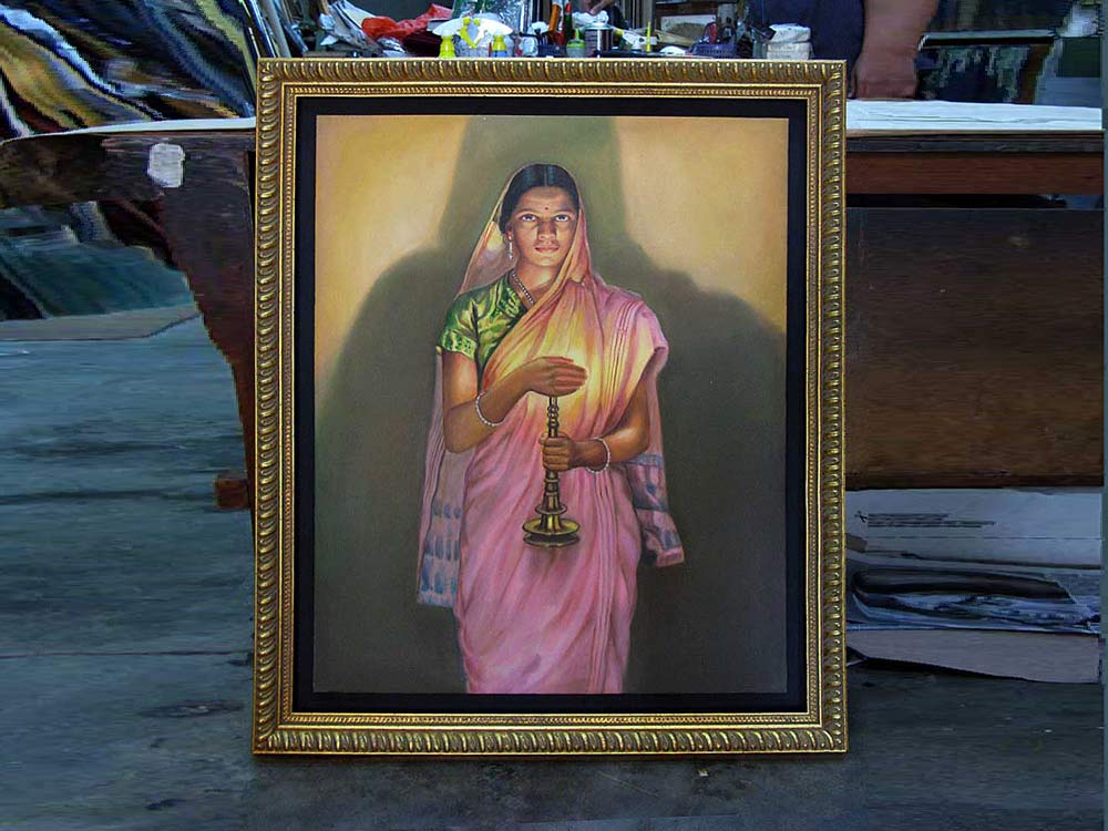 canvas painting frame of lady with lamp in hand