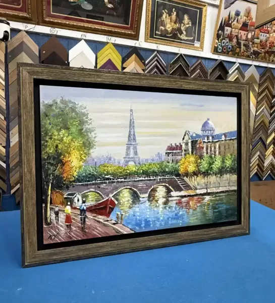 Oil painting professionally framed with a shadow gap frame in Singapore.