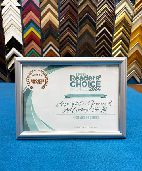 Professional certificate framing with a matching picture frame in Singapore.