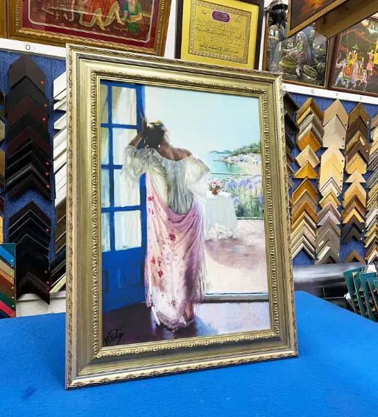 Canvas painting professionally framed with a classic decorative frame in Singapore.