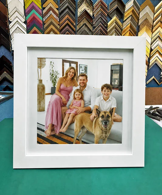 White picture frame with a matboard border for family photographs in Singapore.