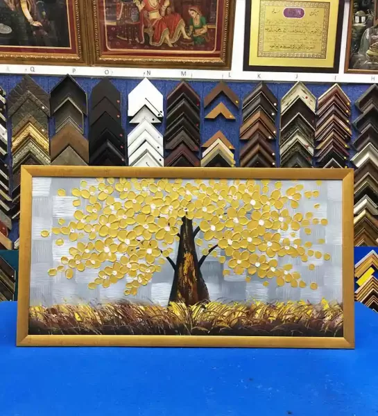 Canvas artwork professionally framed with a simple wood frame in Singapore.