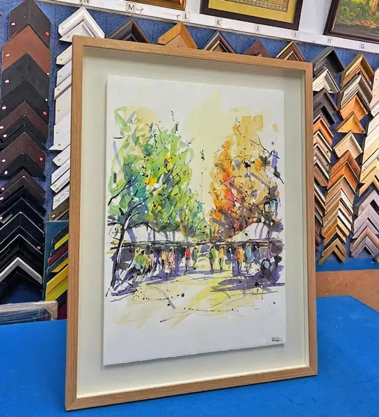 Float-mounted artwork displayed in a box frame with visible edges in Singapore.