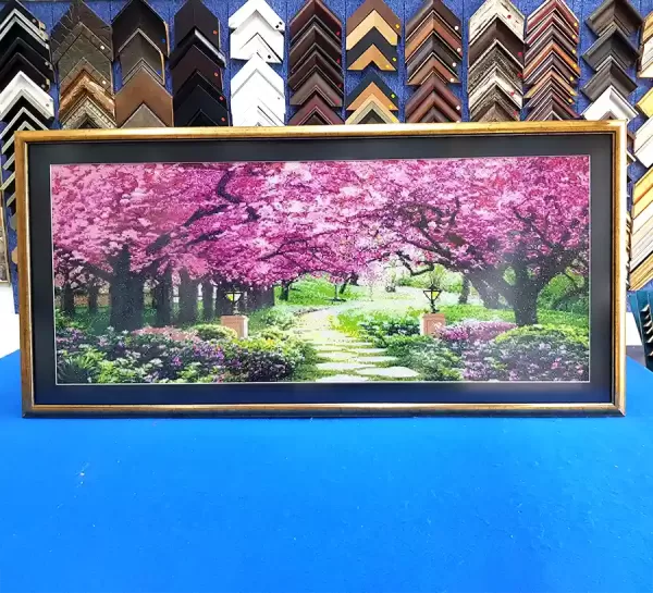 Diamond art painting professionally framed with a decorative matboard border.