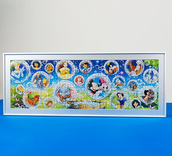 Completed jigsaw puzzle framed with a decorative mat board and aluminium frame in Singapore.matboard border in Singapore.