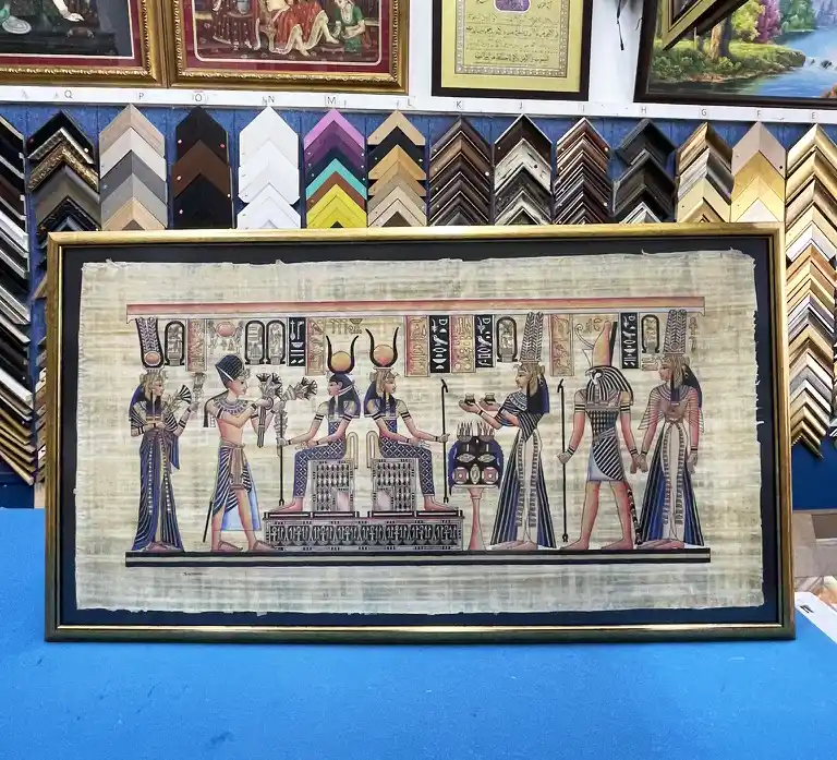 Egyptian papyrus artwork professionally framed with a black background in Singapore.