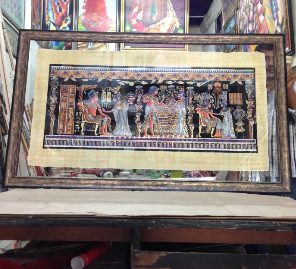 Egyptian papyrus artwork professionally framed with a black background in Singapore.