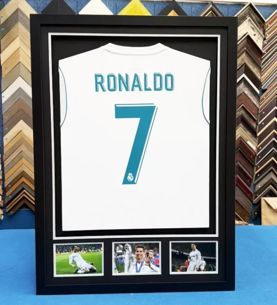 Custom football jersey framing with multiple photographs and double matboard in Singapore.